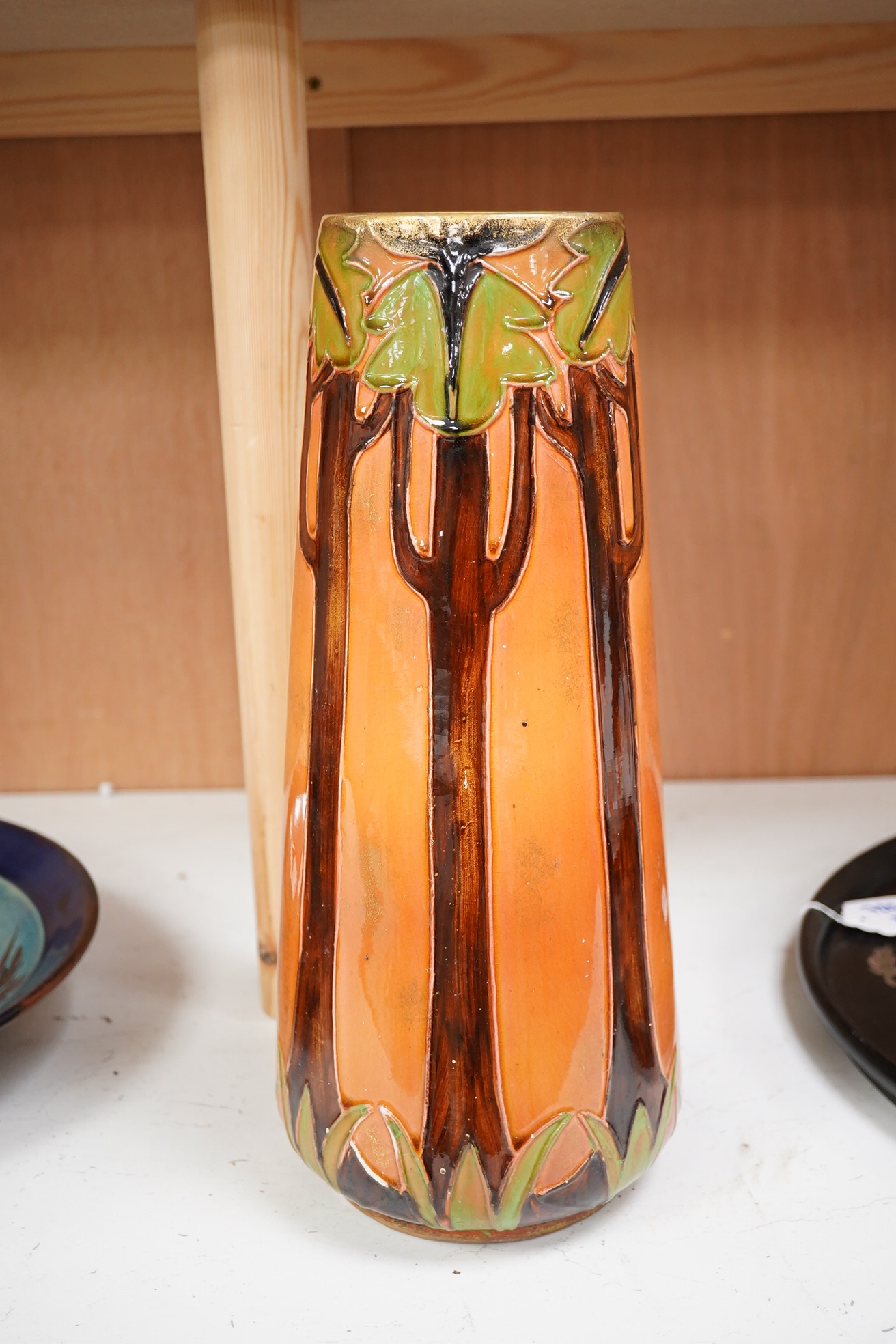 A Continental Art Nouveau tube lined ‘maiden’ vase, 36cm high. Condition - fair